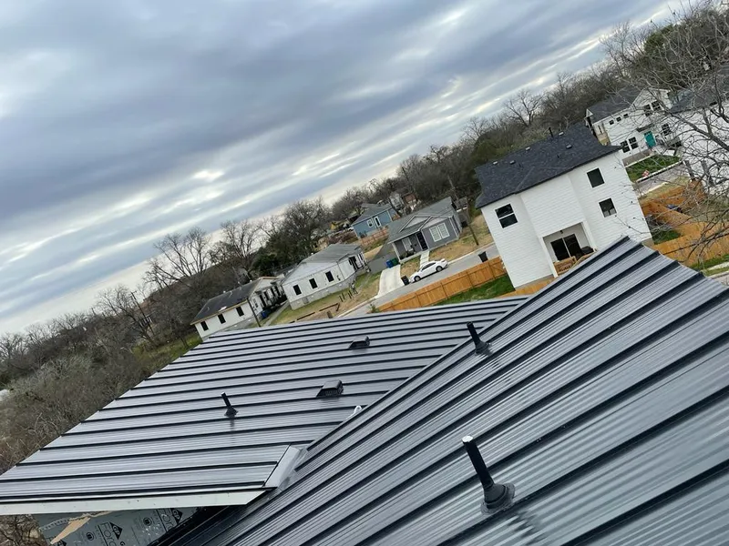 Standing seam metal roof panels with vents for Skylight Repair in Norwalk